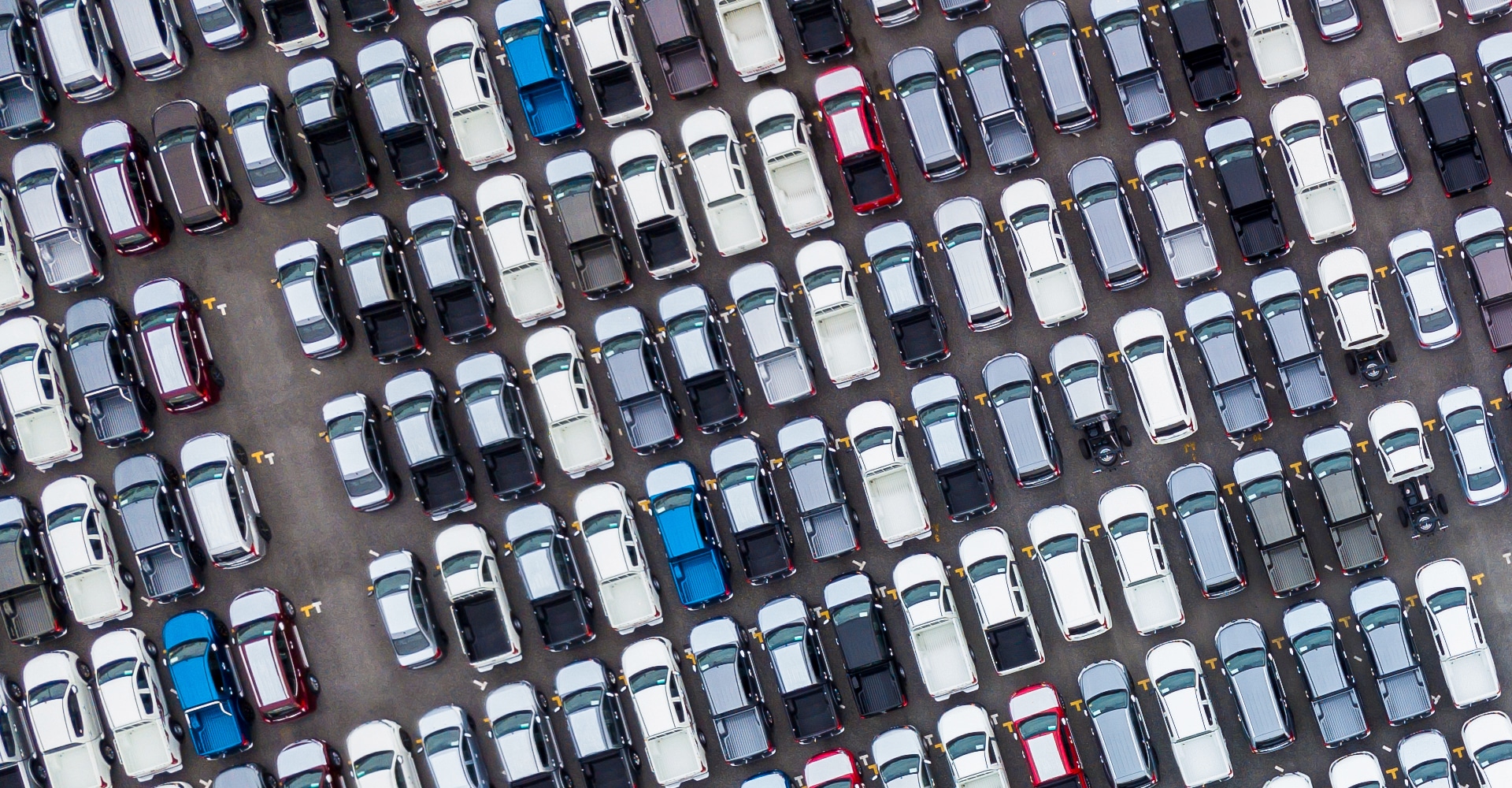 birds view of cars on a parking lot